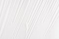 White abstract rippled smooth background with vertical lines. Royalty Free Stock Photo