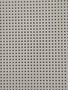 White Acoustic Panel with Regular Square Perforations Royalty Free Stock Photo
