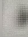 White Acoustic Panel with Regular Square Perforations Royalty Free Stock Photo