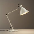 White adjustable desk lamp with a conical shade and articulated arm.