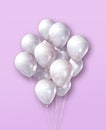 White air balloons group on a light pink background