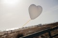 White Air Balloons heart shaped flying in blue sky. Love concept. Holiday celebration Royalty Free Stock Photo