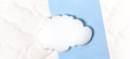 White air cloud on a comfortable mattress texture background and blue background top view. White texture of mattress bedding Royalty Free Stock Photo