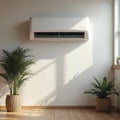 White air conditioner mounted in room with plant pots. Energy efficient cooling system solution for modern residential space, Royalty Free Stock Photo
