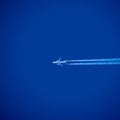 White aircraft and blue sky