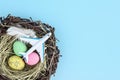 White airplane and easter egg nest flatlay Royalty Free Stock Photo