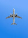 Airplane flying under the sky. Royalty Free Stock Photo