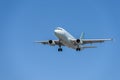 Airplane flying under the sky. Royalty Free Stock Photo