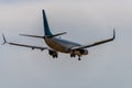 Airplane flying under the sky. Royalty Free Stock Photo