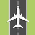 White airplane rides on the runway