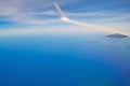 White airplane wing in the blue sky Royalty Free Stock Photo