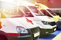 White ambulance cars with a red cross