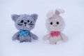 Easter Bunny. Christmas Gift Knitted Handmade Animal Dolls. White Amigurumi Rabbit With Pink Bow Tie And Gray Kitten With Blue Tie