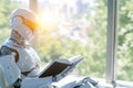 White Android Sitting in Bright Office, Reading Law Book and Gesturing While Discussing