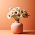 White anemone flowers in a peach fuzz color vase on minimal orange background.