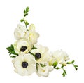 White anemones and freesia flowers in a corner arrangement