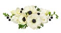 White anemones and freesia flowers in a line arrangement