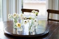 White Anemones and Ranunculus on Dining Room Table