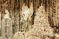 White angel mannequin with white Christmas tree and cage Royalty Free Stock Photo