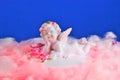 White angel on a pink cloud, romantic inscription for the holiday of lovers