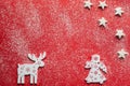 Christmas background.Stars,reindeer and angel on red background. Royalty Free Stock Photo