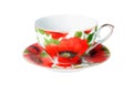 White antique cup with red flowers poppy isolated