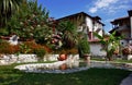 White apartment house with garden and fountain Royalty Free Stock Photo