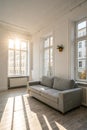 White apartment with gray sofa and sunlight Royalty Free Stock Photo