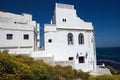 White arabic house and yellow flowers in Tangier,Morocco Royalty Free Stock Photo