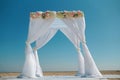Wedding white arch on the beach. Royalty Free Stock Photo