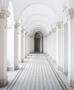 White arch corridor with tiled floor