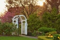 White Arch in Romantic Flower Garden