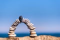 White arch of pebbles Royalty Free Stock Photo