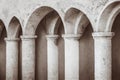 White arches with columns in temple medieval door. Royalty Free Stock Photo