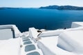 White architecture in Santorini island, Greece. Luxury hotel with sea view. Stairs to the sea