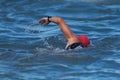 A white arm of a caucasian swimmer athlete swimming