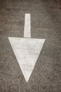 White Arrow Painted on the Asphalt - Traffic Directional sign
