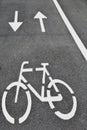 White arrows and bycicle sign Royalty Free Stock Photo