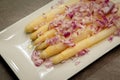 White asparagus dish with onion Royalty Free Stock Photo