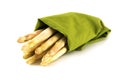 White asparagus, fresh from the market in a green towel isolated Royalty Free Stock Photo