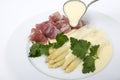 White asparagus with ham and hollandaise sauce