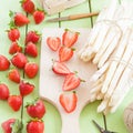 White aspargus and fresh strawberries