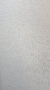 White asymetrical wallpaper on velvet couch Royalty Free Stock Photo