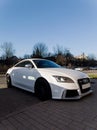 white Audi TT RS parked in a street