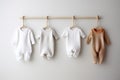 White baby clothes mockup on white background, newborn bodysuit