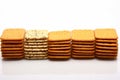 White background accentuates the precision of a row of crackers Royalty Free Stock Photo