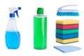 On a white background, bottles for cleaning surfaces, a brush, rags, multi-colored sponges