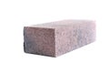 white background. brick made of concrete. multi-colored block for laying a post on the fence. close-up