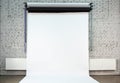 White background on brick wall inside studio Royalty Free Stock Photo