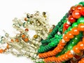 Colorful rosary varieties, white background.